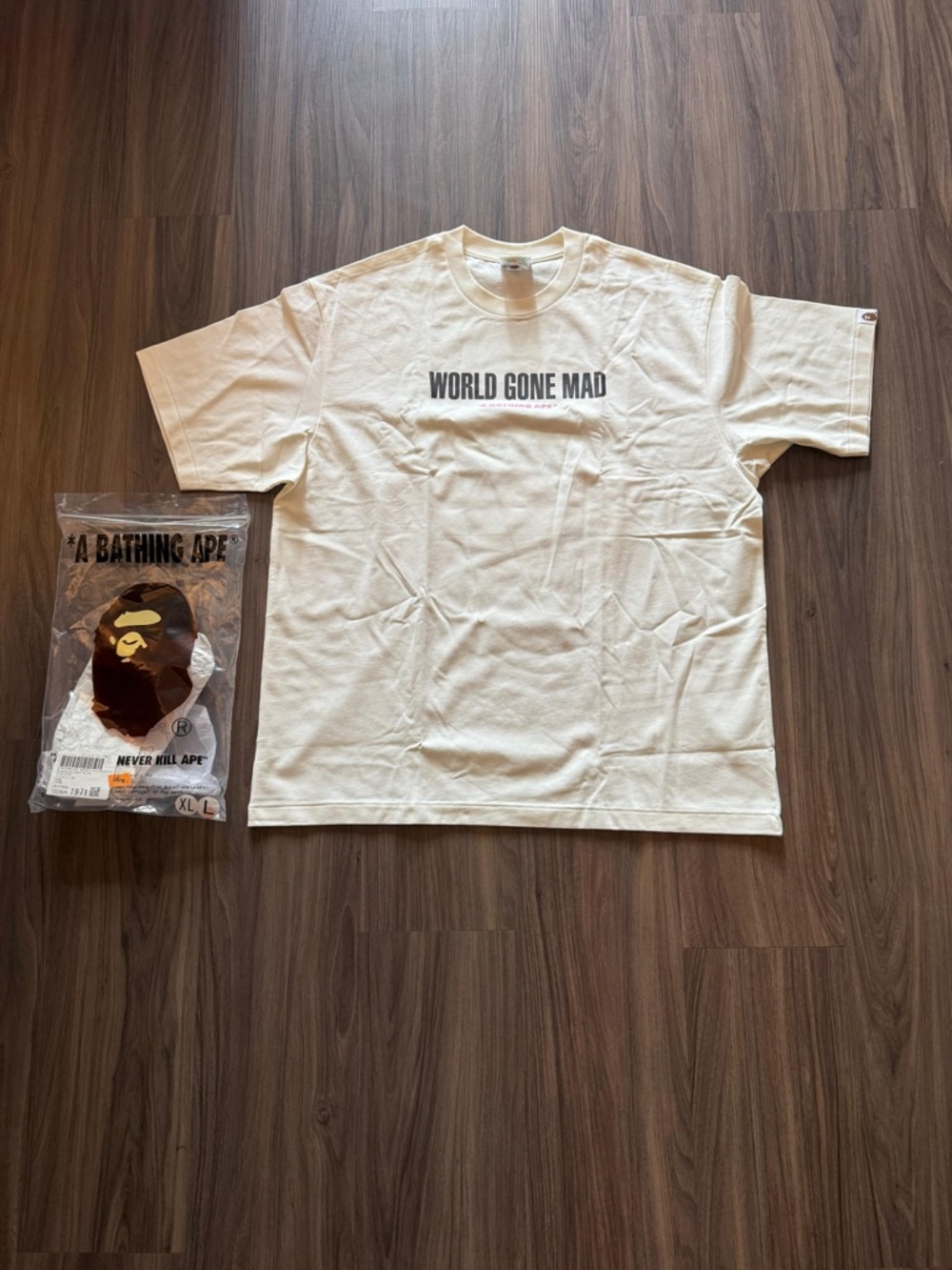 Bape World Gone Mad Short Sleeve T-Shirt in Off-White with Black Text